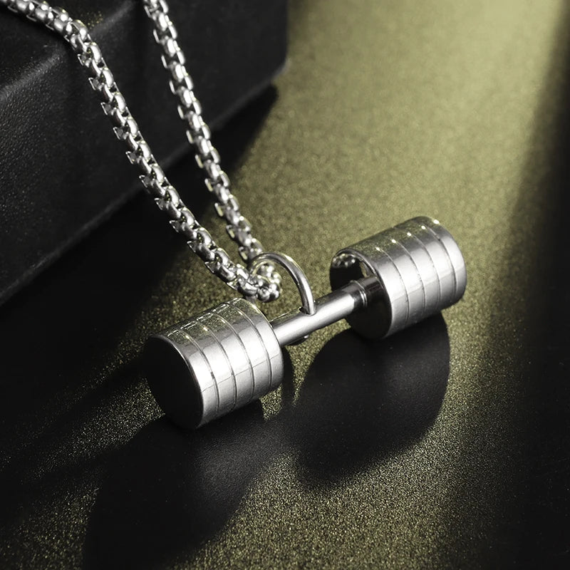 Fashionable dumbbell necklace designed for muscle men, perfect for sports and fitness. It's a great couple's gift and fits well with hip hop gym trends. Ideal jewelry for fitness lovers!