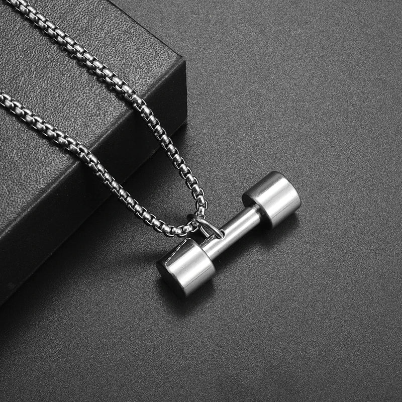 Fashionable dumbbell necklace designed for muscle men, perfect for sports and fitness. It's a great couple's gift and fits well with hip hop gym trends. Ideal jewelry for fitness lovers!