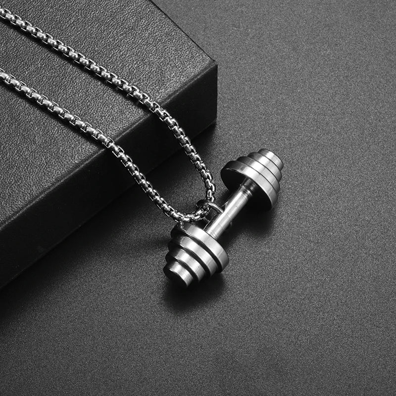 Fashionable dumbbell necklace designed for muscle men, perfect for sports and fitness. It's a great couple's gift and fits well with hip hop gym trends. Ideal jewelry for fitness lovers!