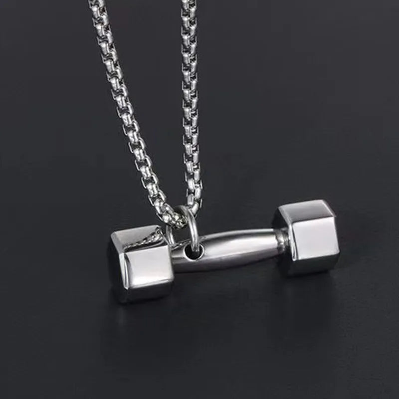 Fashionable dumbbell necklace designed for muscle men, perfect for sports and fitness. It's a great couple's gift and fits well with hip hop gym trends. Ideal jewelry for fitness lovers!