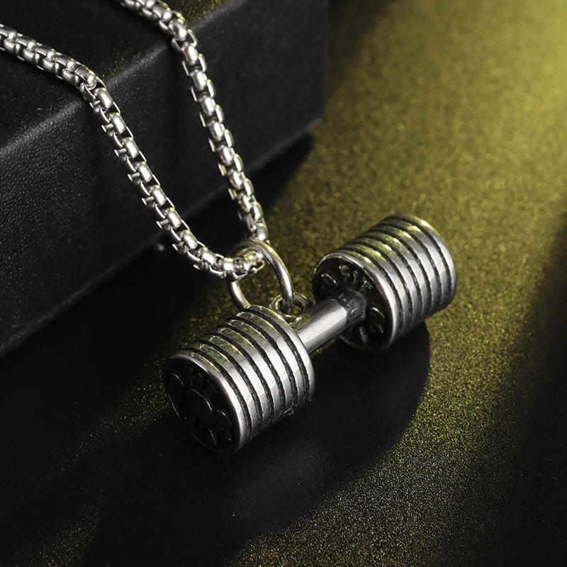 Fashionable dumbbell necklace designed for muscle men, perfect for sports and fitness. It's a great couple's gift and fits well with hip hop gym trends. Ideal jewelry for fitness lovers!