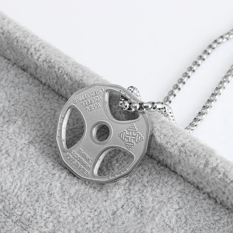 Fashionable dumbbell necklace designed for muscle men, perfect for sports and fitness. It's a great couple's gift and fits well with hip hop gym trends. Ideal jewelry for fitness lovers!