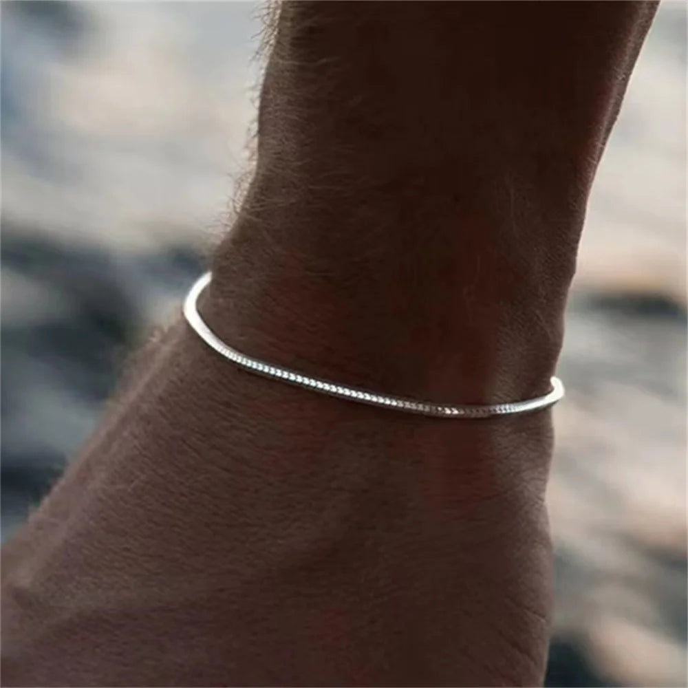 "Simple Stainless Steel Square Snake Bone Chain Bracelet: Hip-Hop Vibes!

Looking to add some hip-hop flair to your style? This stainless steel square snake bone chain bracelet is the perfect accessory for trendy party looks or everyday wear. Whether you'