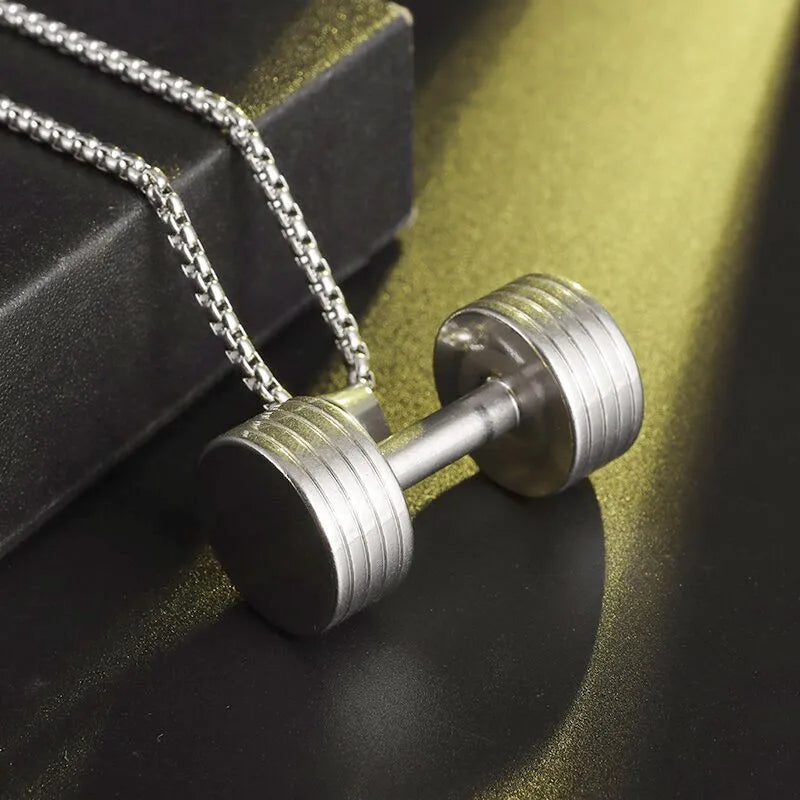 Fashionable dumbbell necklace designed for muscle men, perfect for sports and fitness. It's a great couple's gift and fits well with hip hop gym trends. Ideal jewelry for fitness lovers!